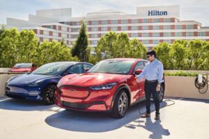 Read more about the article Hilton and Tesla Partnered to Install Thousands of EV Chargers at Hotels